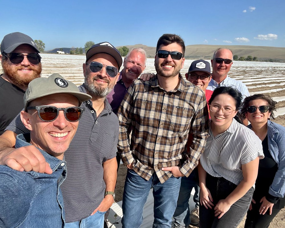 True Terpenes executive team at the hemp field